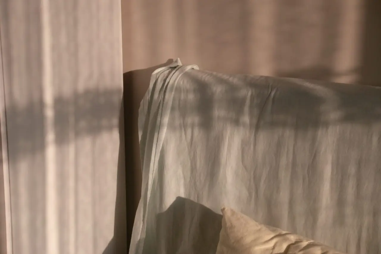 Linen bedding in warm late-afternoon light